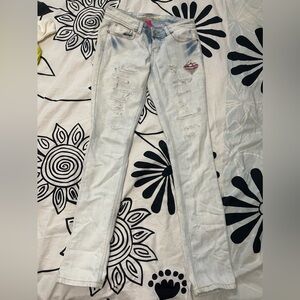 Distressed light wash denim pants